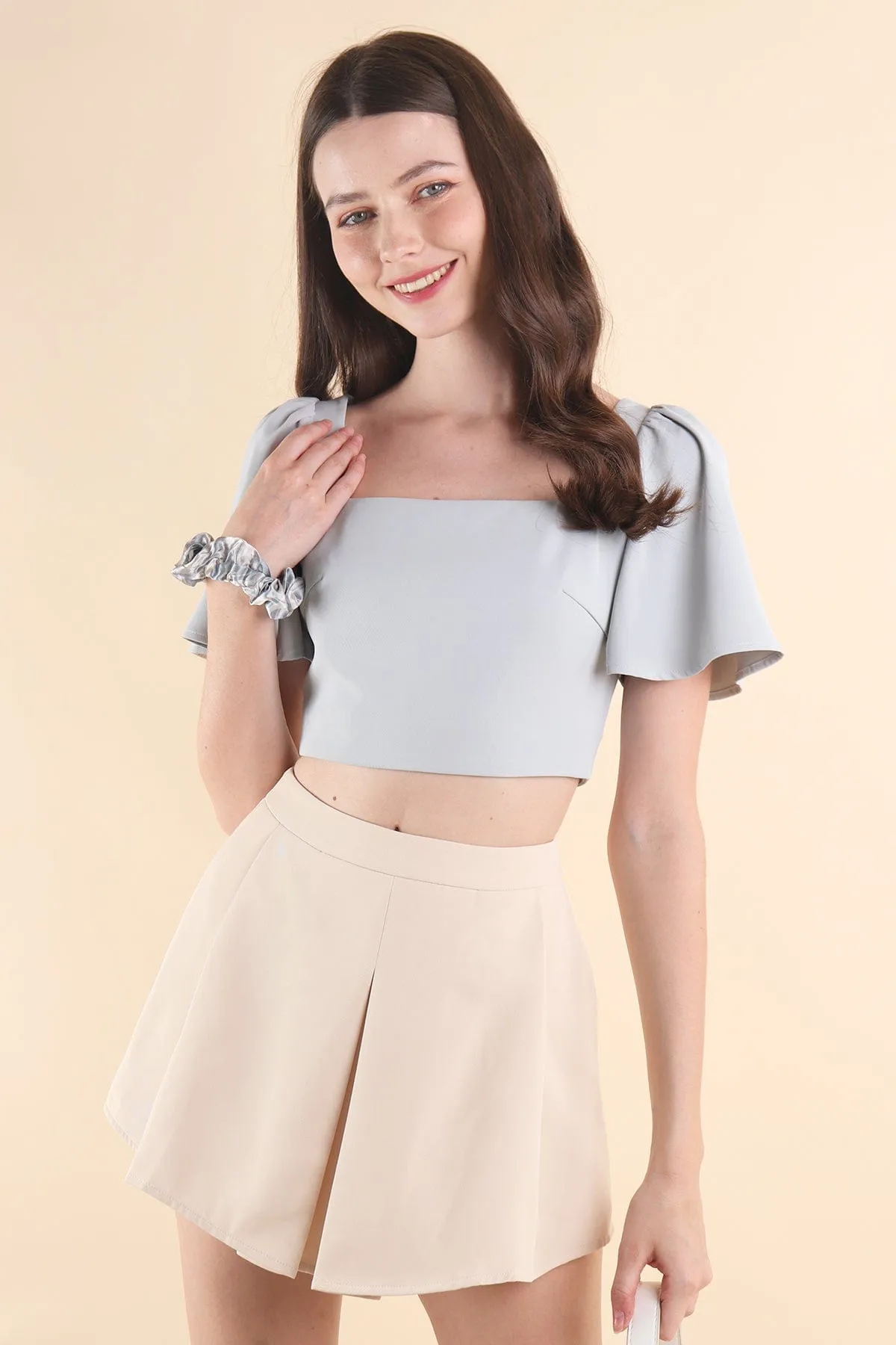 MINNIE FLUTTERS TOP IN BLUE